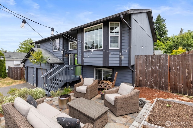 2954 Lowren Loop, Port Orchard, WA 98366 - rear view of property featuring an outdoor living space, a garage, and driveway