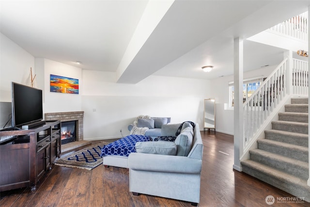2954 Lowren Loop, Port Orchard, WA 98366 - living room featuring wood finished floors, stairs, and a brick fireplace