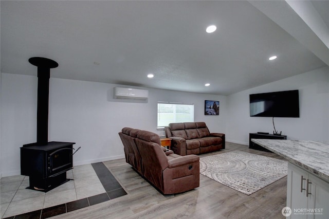7493 State Route 9, Sedro Woolley, WA 98284 - living room featuring a wall mounted air conditioner, a wood stove, recessed lighting, and light wood finished floors