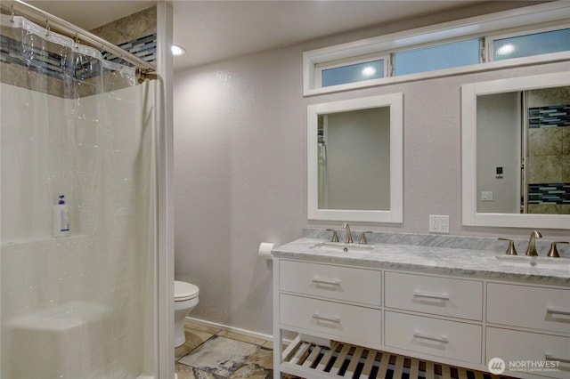 7493 State Route 9, Sedro Woolley, WA 98284 - full bath with a shower with shower curtain, double vanity, and a textured wall