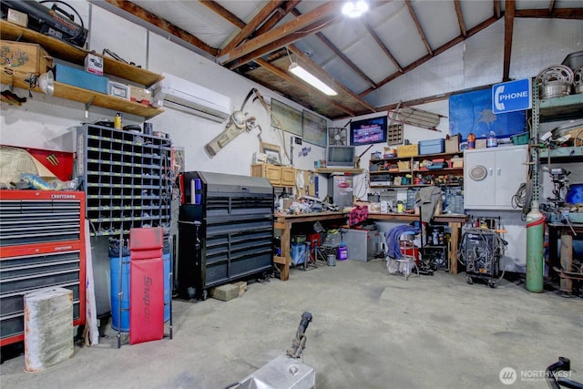 7493 State Route 9, Sedro Woolley, WA 98284 - garage featuring a workshop area and a wall mounted AC