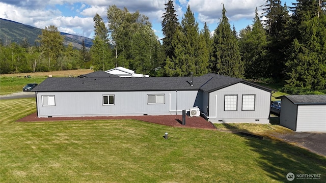 7493 State Route 9, Sedro Woolley, WA 98284 - rear view of property with crawl space, a lawn, a mountain view, and a shingled roof
