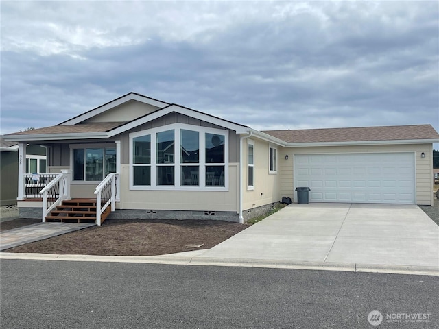 926 N Rock Rose Ave, Sequim, WA 98382 - view of front facade with crawl space, concrete driveway, and a garage