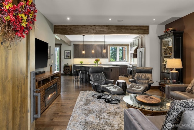 151 Miners Camp Way, Cle Elum, WA 98922 - living room with dark wood-style floors, recessed lighting, beam ceiling, and a glass covered fireplace