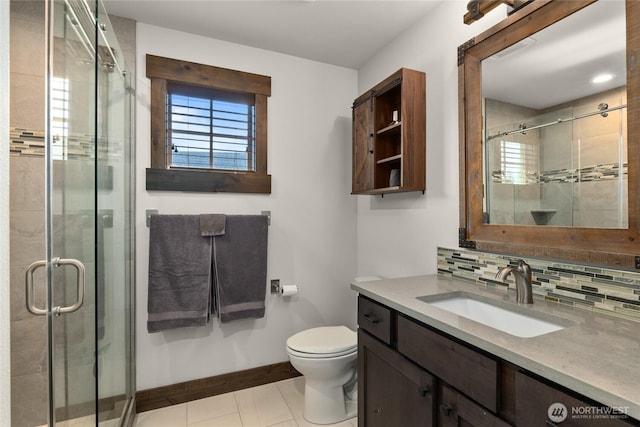 151 Miners Camp Way, Cle Elum, WA 98922 - full bath featuring vanity, a stall shower, decorative backsplash, and tile patterned flooring