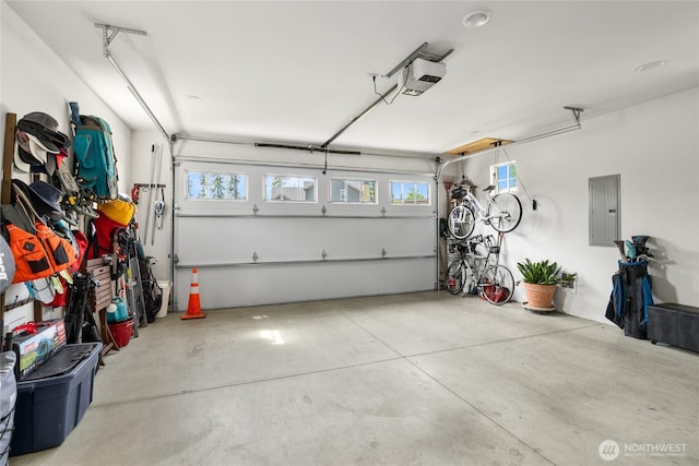 151 Miners Camp Way, Cle Elum, WA 98922 - garage featuring electric panel and a garage door opener