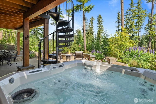 151 Miners Camp Way, Cle Elum, WA 98922 - view of pool featuring stairs, a hot tub, an outdoor fire pit, and a patio