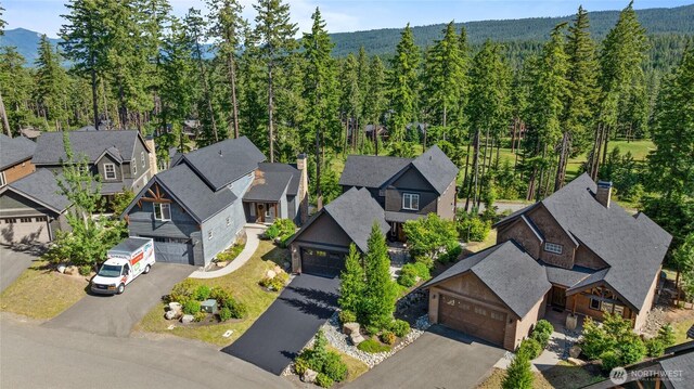 151 Miners Camp Way, Cle Elum, WA 98922 - aerial perspective of suburban area with a forest