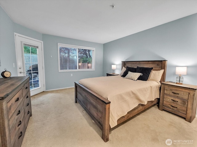 2218 S 336th St Unit 604, Federal Way, WA 98003 - bedroom featuring light colored carpet and access to exterior