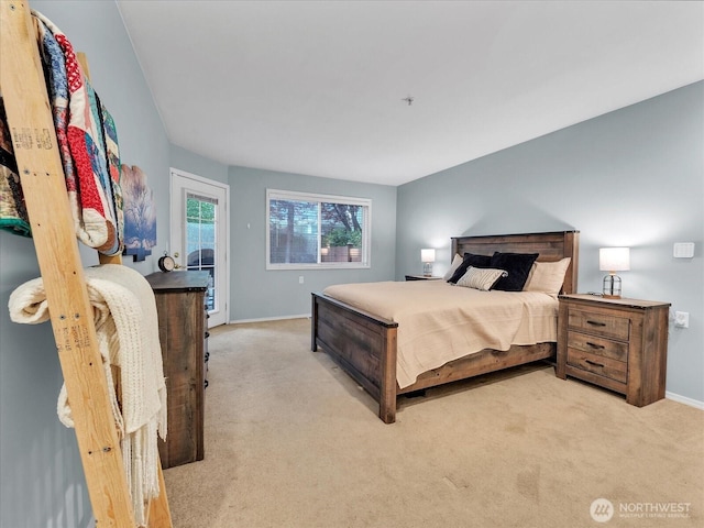 2218 S 336th St Unit 604, Federal Way, WA 98003 - bedroom with light colored carpet and access to outside