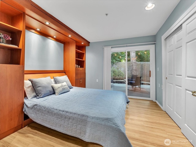 2218 S 336th St Unit 604, Federal Way, WA 98003 - bedroom featuring access to exterior, wood finished floors, and recessed lighting