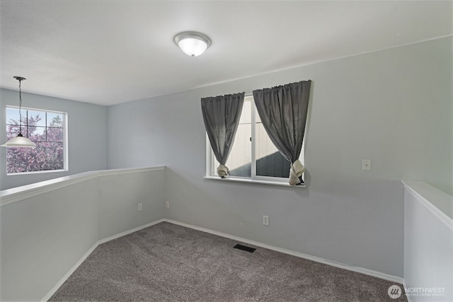1407 196th St E, Spanaway, WA 98387 - carpeted spare room featuring baseboards