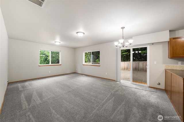 4817 S 251st Ct, Kent, WA 98032 - spare room featuring a chandelier and carpet