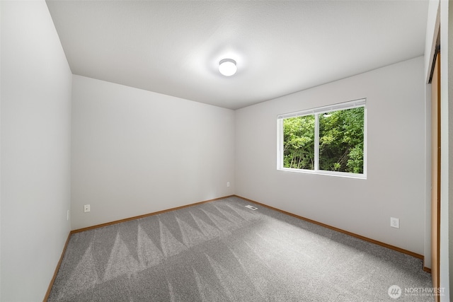 4817 S 251st Ct, Kent, WA 98032 - carpeted empty room with baseboards