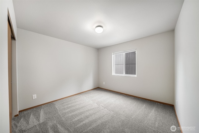 4817 S 251st Ct, Kent, WA 98032 - carpeted spare room with baseboards