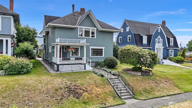 1116 N J St, Tacoma, WA 98403 - shingle-style home with a chimney, a front lawn, and a porch