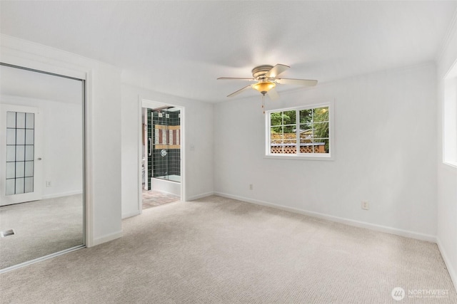14023 Meridian Ave N, Seattle, WA 98133 - unfurnished bedroom featuring carpet floors and ceiling fan