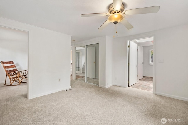 14023 Meridian Ave N, Seattle, WA 98133 - unfurnished room with carpet and ceiling fan