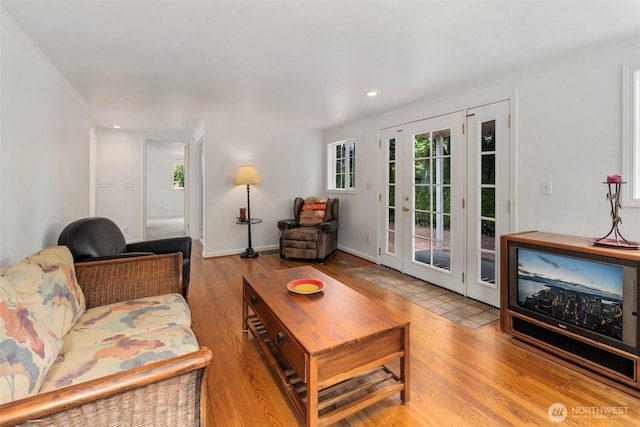 14023 Meridian Ave N, Seattle, WA 98133 - living area featuring wood finished floors, french doors, and recessed lighting