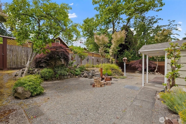 14023 Meridian Ave N, Seattle, WA 98133 - fenced backyard featuring a patio area