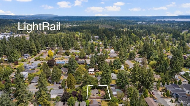 14023 Meridian Ave N, Seattle, WA 98133 - aerial perspective of suburban area with property parcel outlined and a heavily wooded area