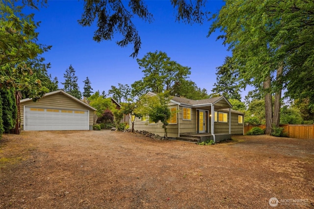 14023 Meridian Ave N, Seattle, WA 98133 - view of front of home featuring a detached garage and an outdoor structure