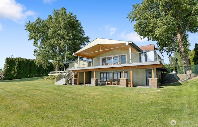 2102 NE Elgin Rd, Moses Lake, WA 98837 - back of property featuring a yard, a wooden deck, and stairway