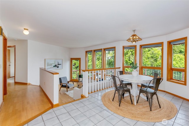 7401 E Heather Way, Everett, WA 98203 - dining room featuring a chandelier and light tile patterned floors