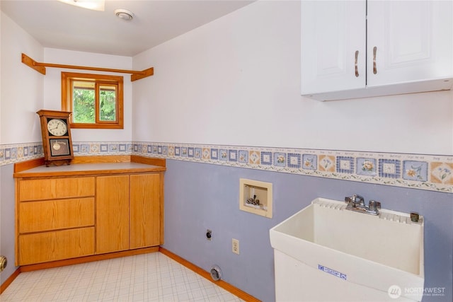 7401 E Heather Way, Everett, WA 98203 - laundry area with cabinet space, hookup for a washing machine, electric dryer hookup, and light floors