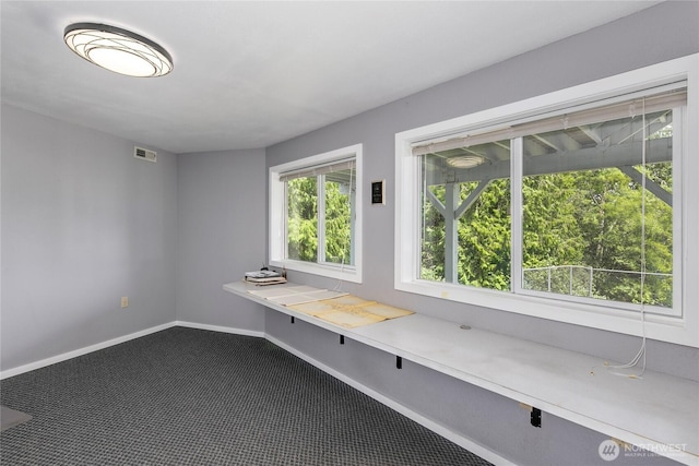 7401 E Heather Way, Everett, WA 98203 - interior space featuring baseboards and dark colored carpet