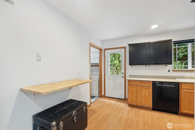 1625 Lincoln St, Bellingham, WA 98229 - kitchen with black dishwasher, washer / dryer, healthy amount of natural light, light wood-type flooring, and recessed lighting