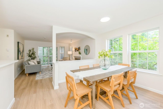 18505 SE Newport Way Unit E221, Issaquah, WA 98027 - dining room with light wood finished floors and baseboards