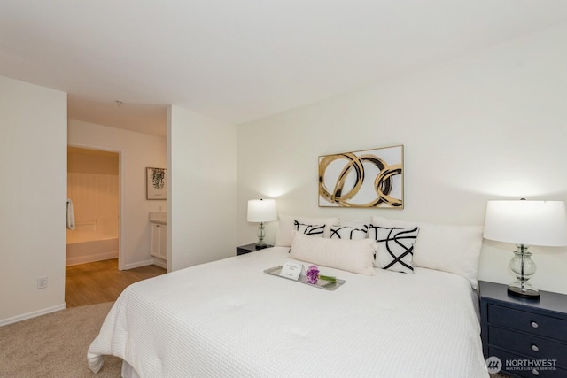 18505 SE Newport Way Unit E221, Issaquah, WA 98027 - bedroom with carpet and ensuite bathroom