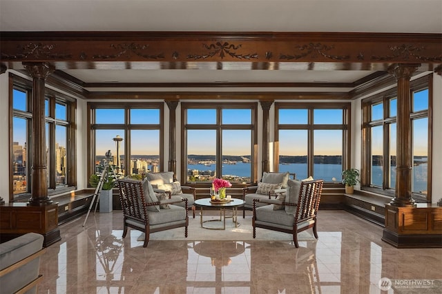 1214 Warren Ave N, Seattle, WA 98109 - sunroom featuring decorative columns, a water view, and marble tiled flooring
