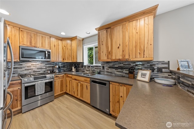 2702 Shannon Point Rd, Anacortes, WA 98221 - kitchen featuring stainless steel appliances, dark countertops, tasteful backsplash, and recessed lighting