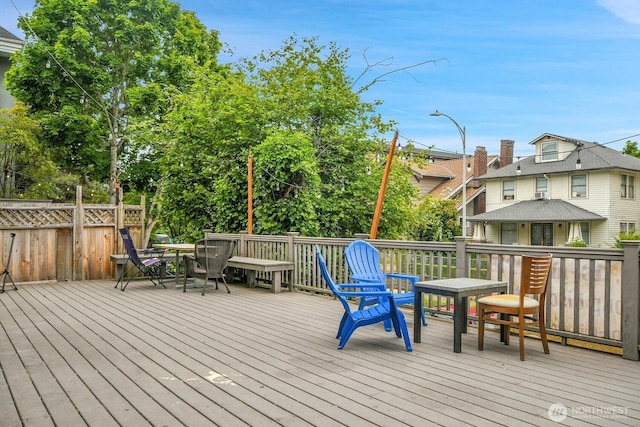 4715 19th Ave NE, Seattle, WA 98105 - wooden terrace with outdoor dining area