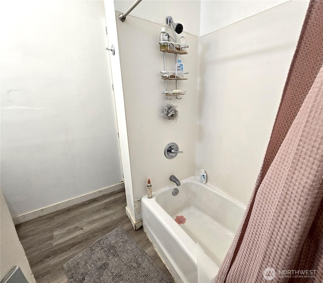 4715 19th Ave NE, Seattle, WA 98105 - bathroom with shower / bathtub combination with curtain and wood finished floors