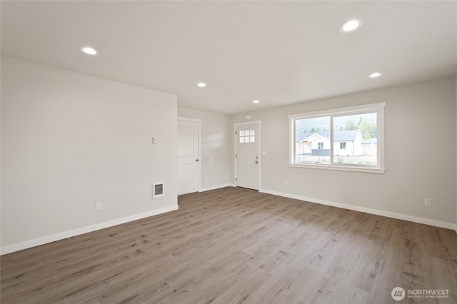 8256 Gold Run Dr, Maple Falls, WA 98266 - unfurnished living room featuring wood finished floors and recessed lighting