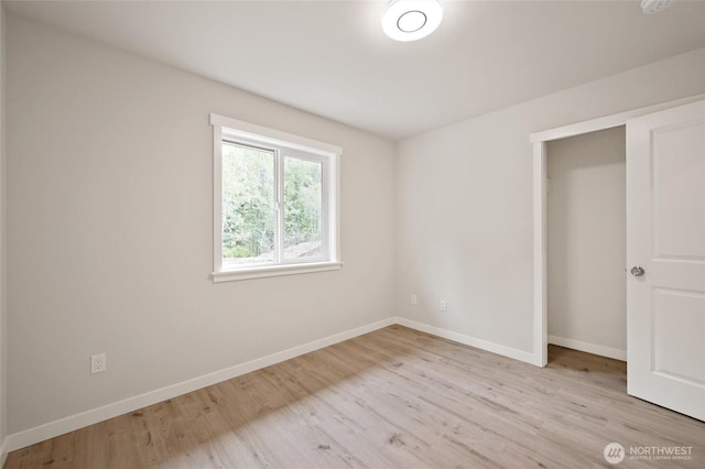 8256 Gold Run Dr, Maple Falls, WA 98266 - unfurnished bedroom featuring light wood-style flooring and baseboards