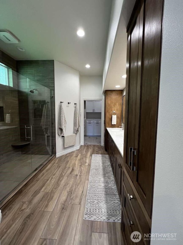 12003 Summit Haven Pl, Yakima, WA 98908 - full bathroom featuring vanity, a shower stall, wood finished floors, and recessed lighting