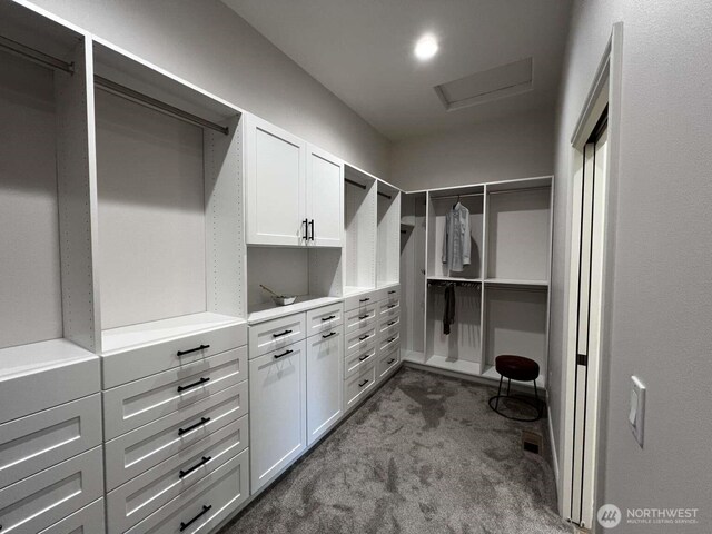12003 Summit Haven Pl, Yakima, WA 98908 - walk in closet featuring dark colored carpet and attic access