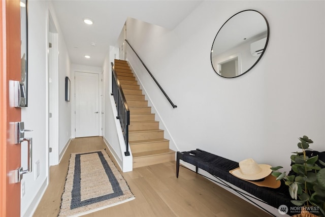 12257 137th Pl NE Unit 2901, Redmond, WA 98052 - foyer entrance featuring light wood-style flooring, recessed lighting, and stairs