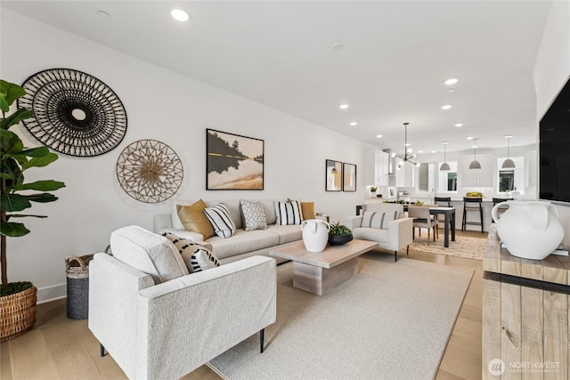 12257 137th Pl NE Unit 2901, Redmond, WA 98052 - living room with light wood finished floors and recessed lighting