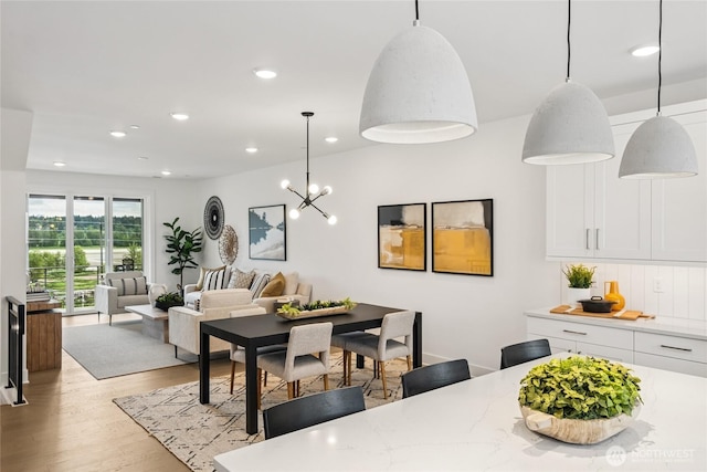 12257 137th Pl NE Unit 2901, Redmond, WA 98052 - dining space featuring light wood-style floors and recessed lighting