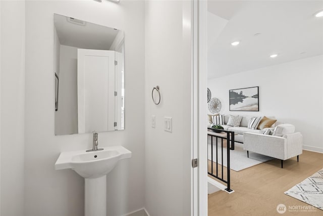 12257 137th Pl NE Unit 2901, Redmond, WA 98052 - bathroom with recessed lighting and wood finished floors