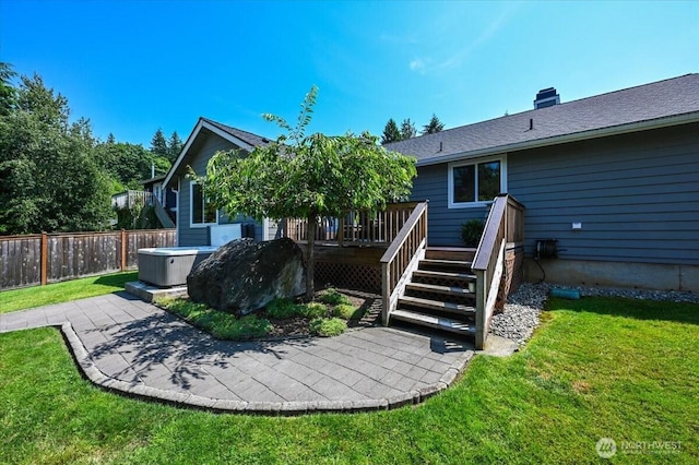 26908 NE Bird St, Duvall, WA 98019 - back of property featuring a hot tub, a deck, and a chimney