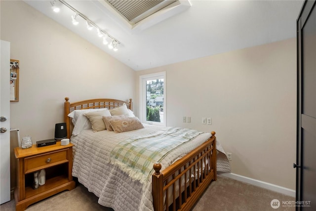 2117 N 29th St, Tacoma, WA 98403 - bedroom featuring carpet floors, vaulted ceiling, and track lighting