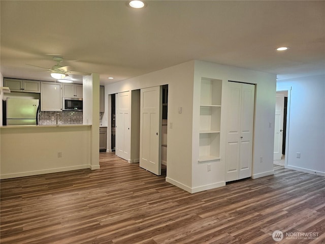 509 S 323rd Pl Unit 15E, Federal Way, WA 98003 - unfurnished living room featuring dark wood finished floors, recessed lighting, and ceiling fan