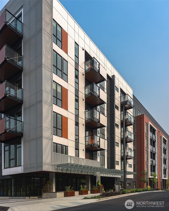 1085 103rd Ave NE Unit 217, Bellevue, WA 98004 - view of apartment building / complex