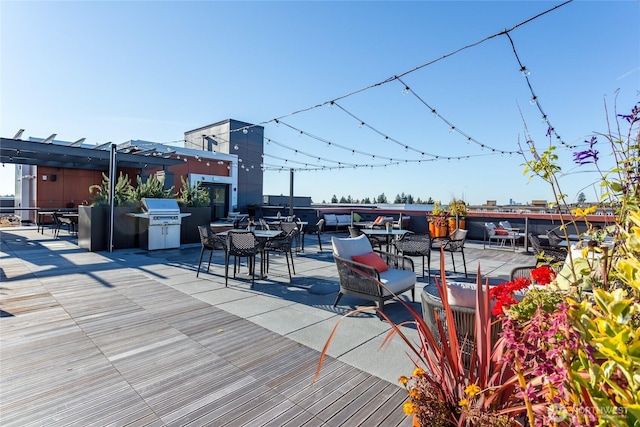 1085 103rd Ave NE Unit 217, Bellevue, WA 98004 - deck featuring area for grilling and outdoor dining space